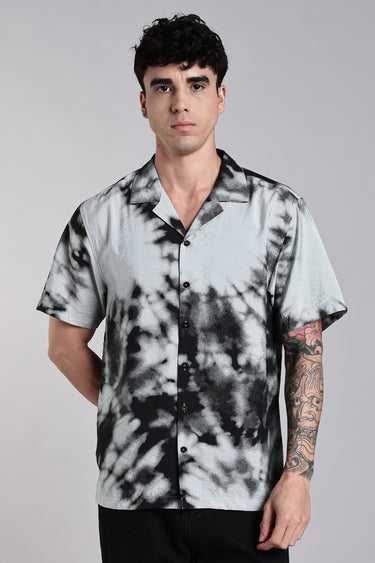 a man wearing black tie dye shirt - front view