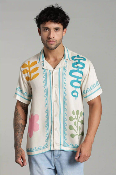A MAN POSING WHILE WEARING OASIS PRINT SHIRT FOR MEN