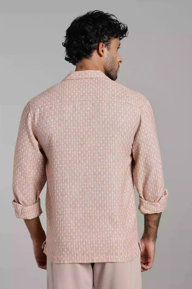 backview of a man wearing pink jacquard shirt