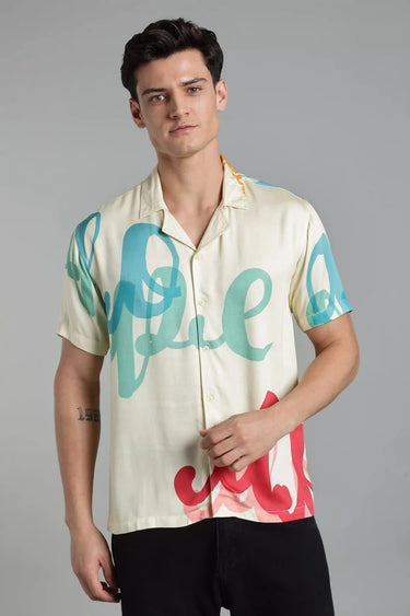 A man wearing LYVN's dope printed shirt