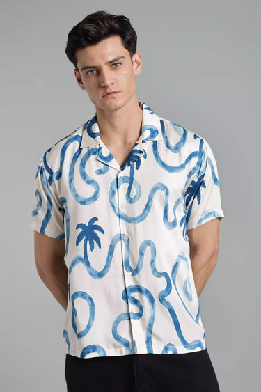 Man wearing a Short-Sleeve Palm Tree Shirt for Men on a gray background