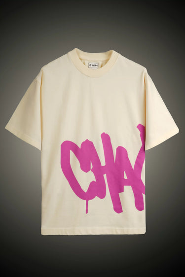 Beige unisex oversized t-shirt with pink 'CHAOTIC' graphic printed on the t-shirt
