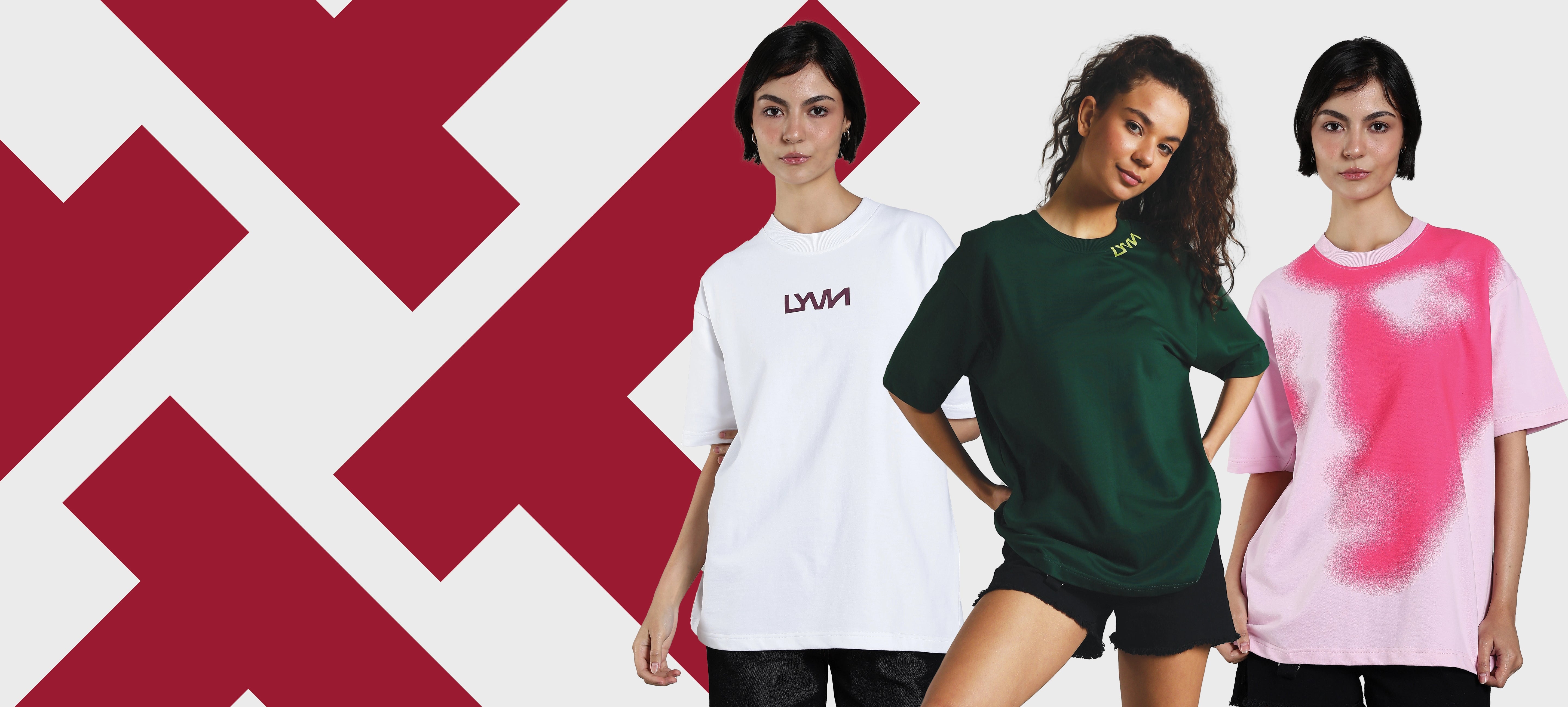 Three women wearing different colored unisex oversized t-shirts with a geometric red and white background