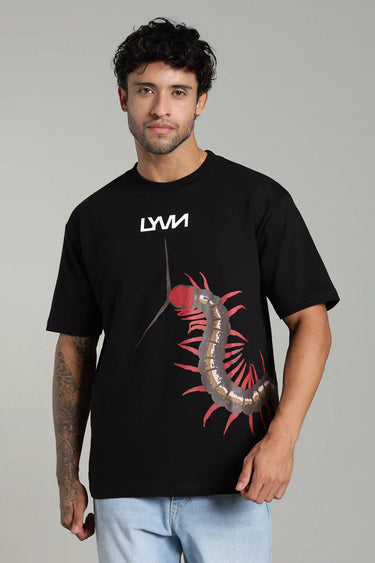a man wearing the black centipede oversized t-shirt - front view