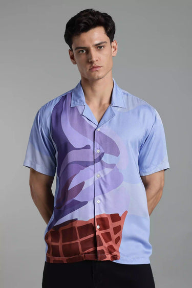 a man wearing ice cream cone print shirt 