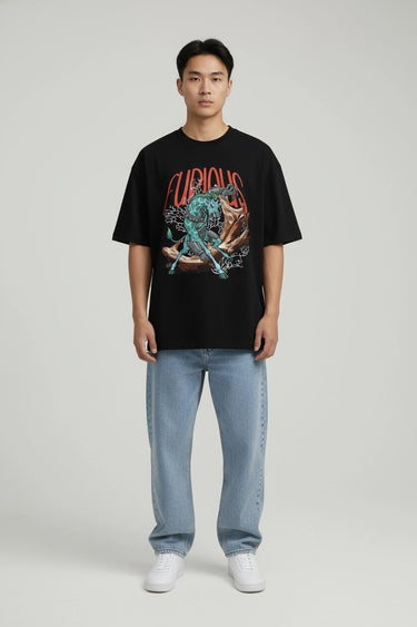 Black oversized graphic t-shirt with colorful Furious design, paired with light blue jeans and white sneakers, worn by a.