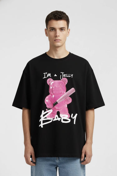 Black oversized graphic t-shirt with pink jelly baby balloon design and white text on front.