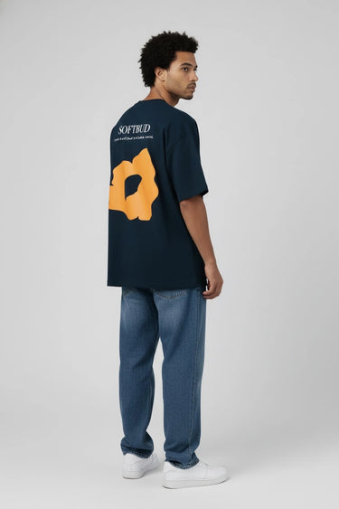 a guy rocking the soft bud petrol blue oversized graphic t-shirt