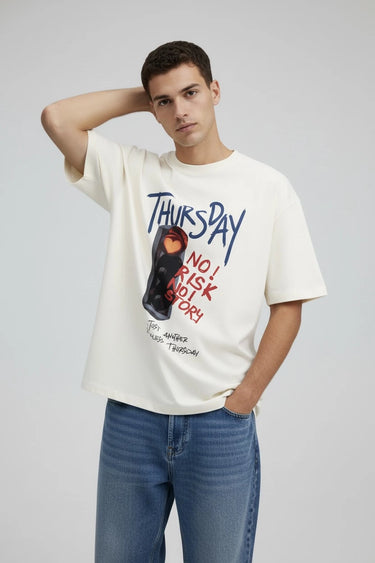 Model wearing thursday oversized graphic tee - half white