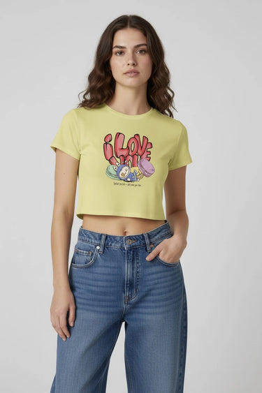Yellow graphic crop top with colorful monster print and short sleeves. - LYVN