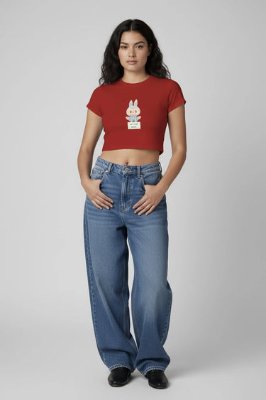 A woman wearing red drama graphic crop top  