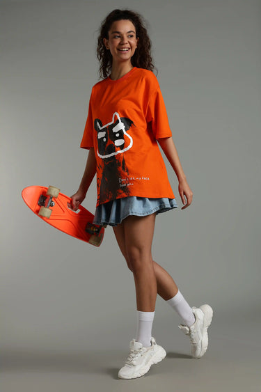 side profile of a woman wearing dog print oversized t shirt - front view