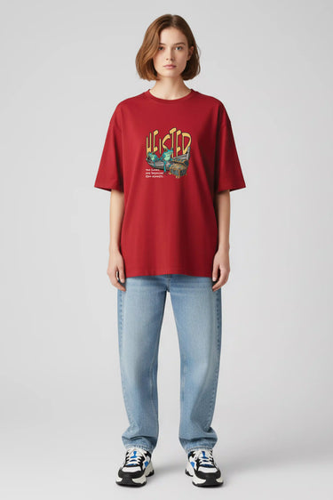 Red Heisted oversized graphic t-shirt with colorful logo print, paired with light blue jeans and sneakers.