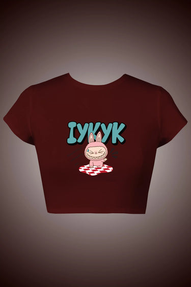 Maroon crop top with a labubu design and text on a dark background