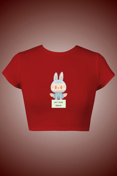 Red crop top with a labubu design on a brown background