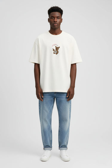 a man wearing oversized graphic t-shirt